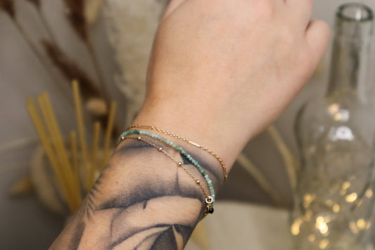 Bracelet pierres précieuses émeraude.